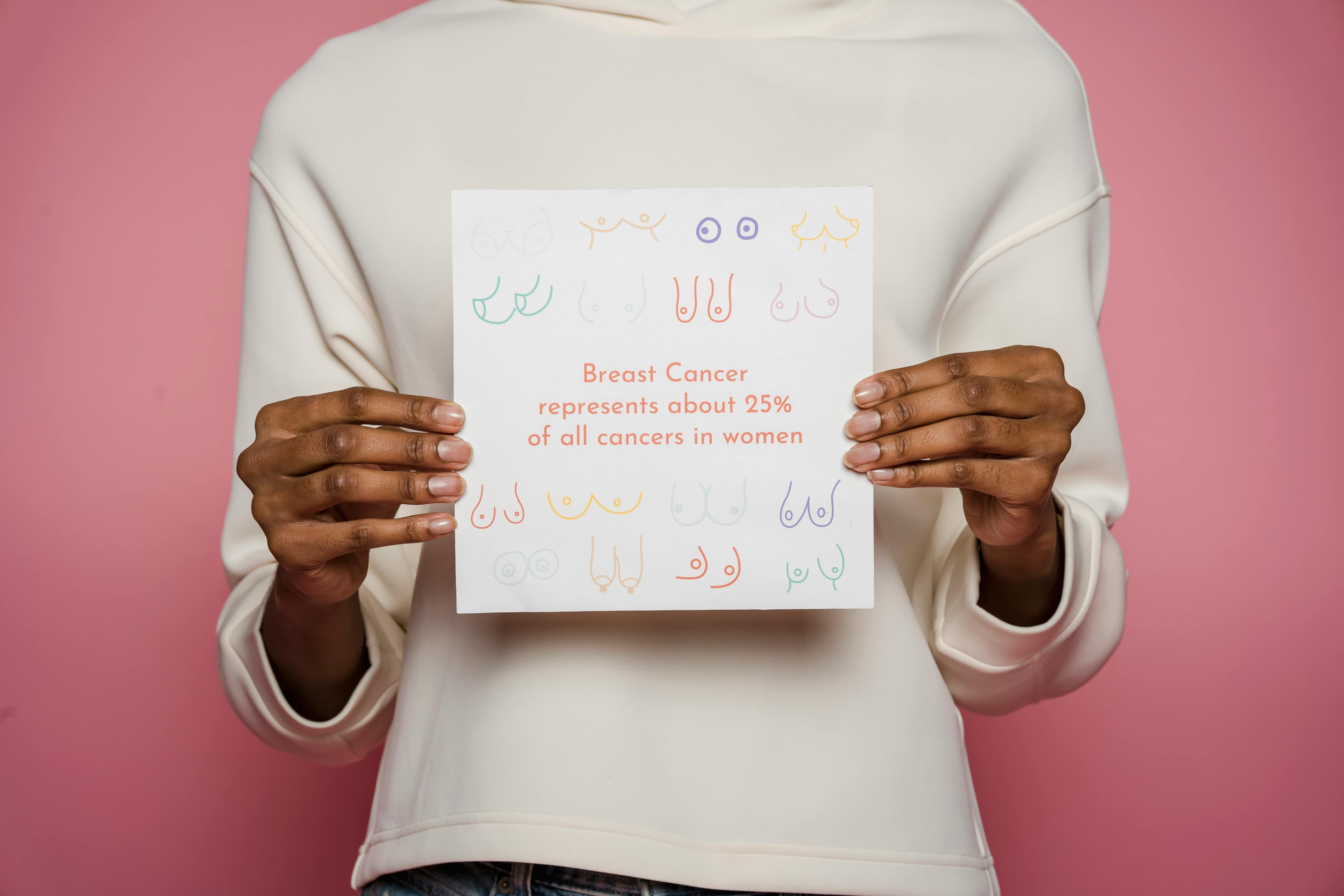 Happy woman enjoying a colorful meal prepped lunch at her desk