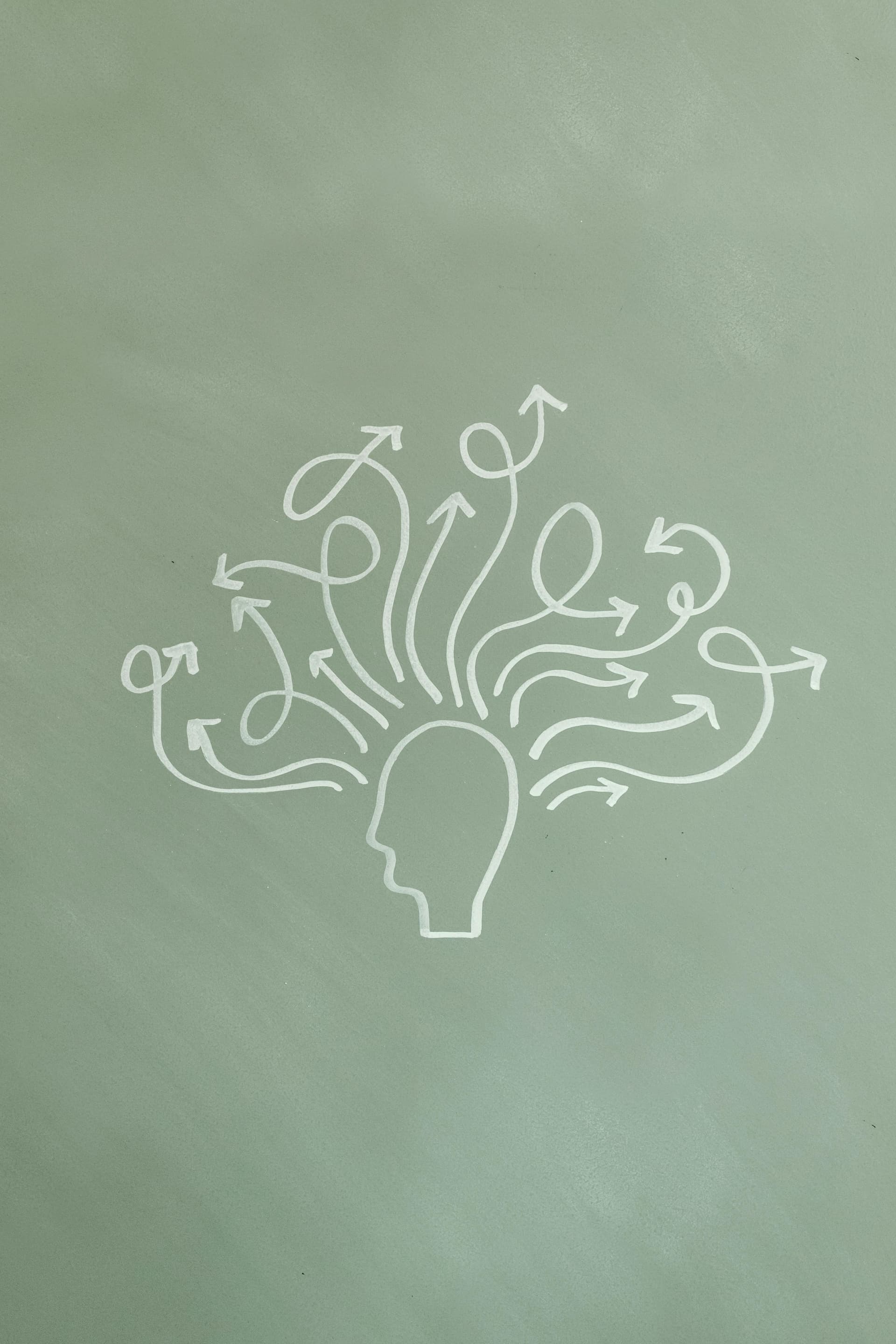 Supplements and vitamins on a white surface with plants